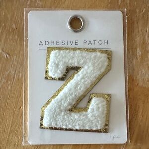 Zeta—Gold and White Adhesive Patch